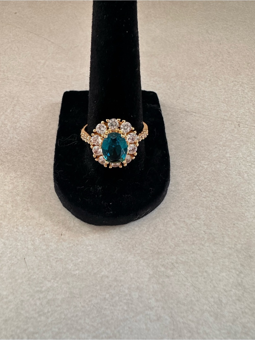 Gold Filled Ring with Teal Oval Center and Clear Halo Stones
